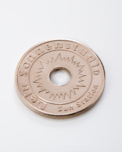 Tanning salon token